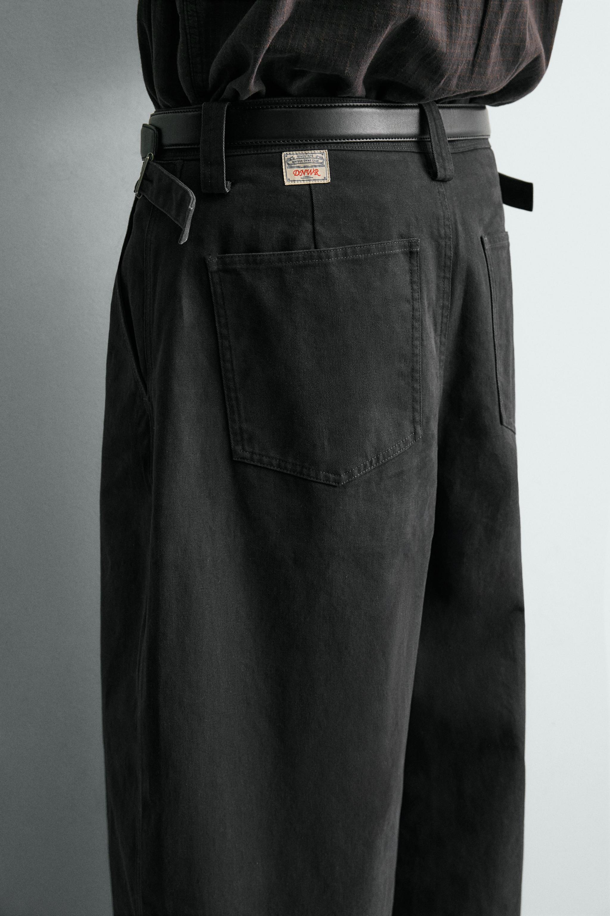 RELAXED FIT PANTS WITH TWISTED SEAM